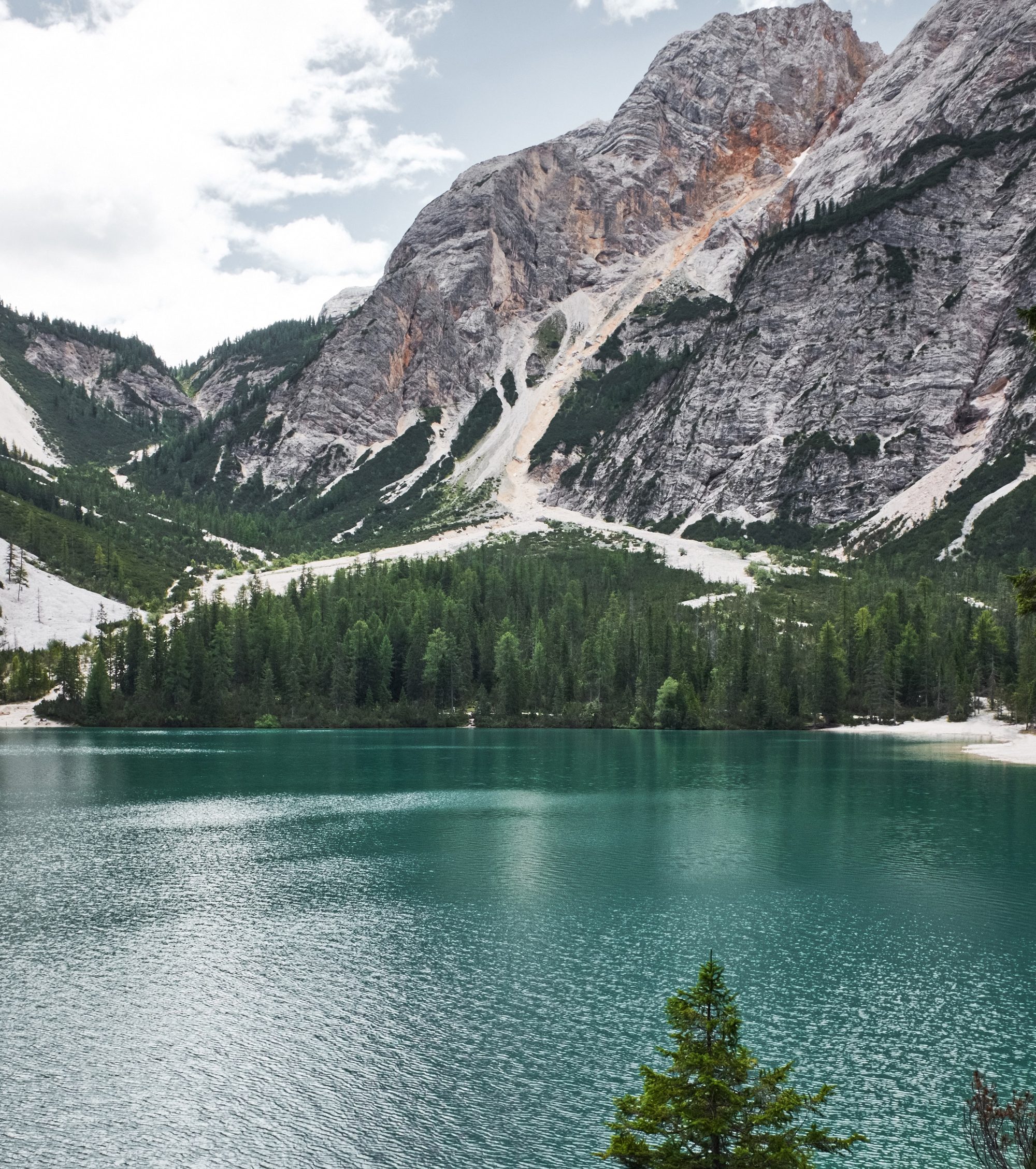Mountain lake reflecting the Colorado Rockies.